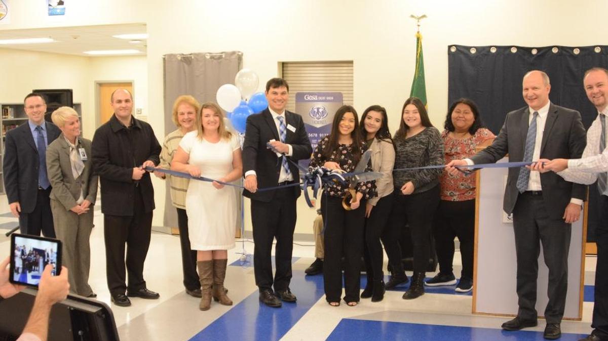 Pasco School District officials celebrate the opening of the new New Horizons High School building, which is located in the former “W” Building on the Columbia Basin College campus.