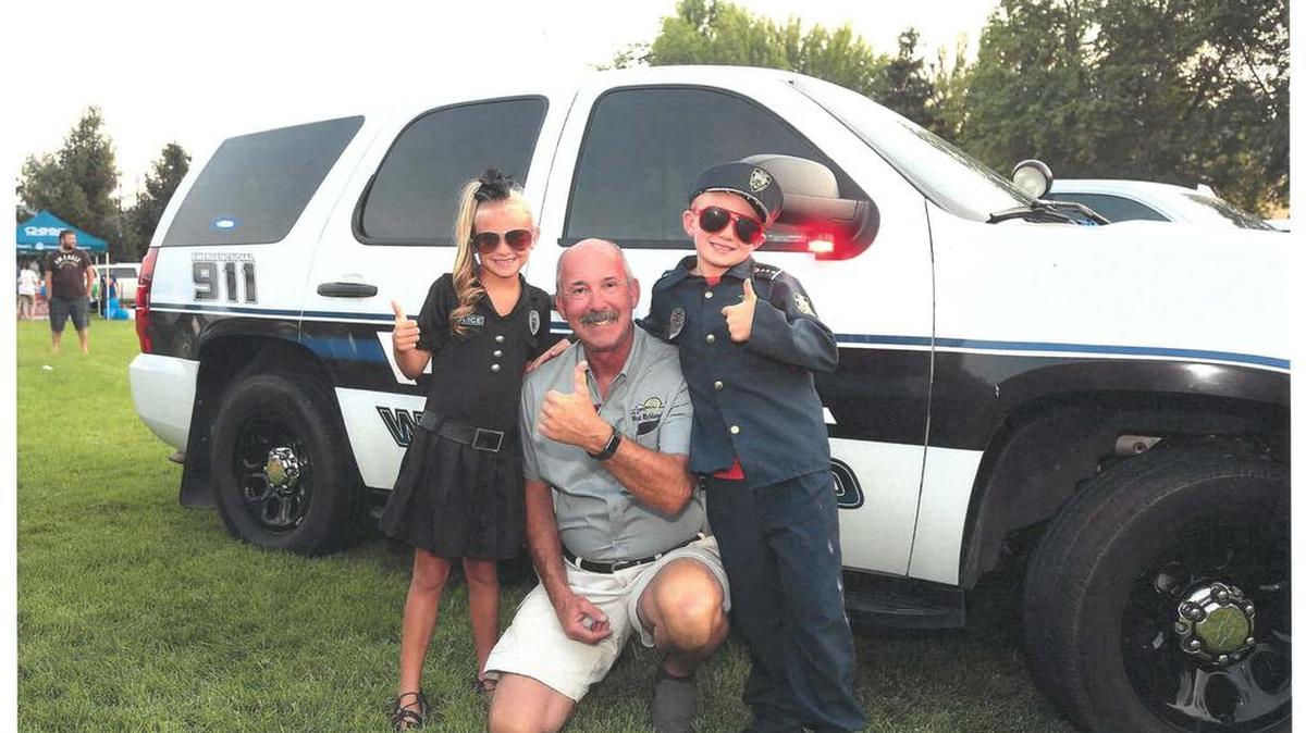Mayor Gerry with two little officers at National Night Out