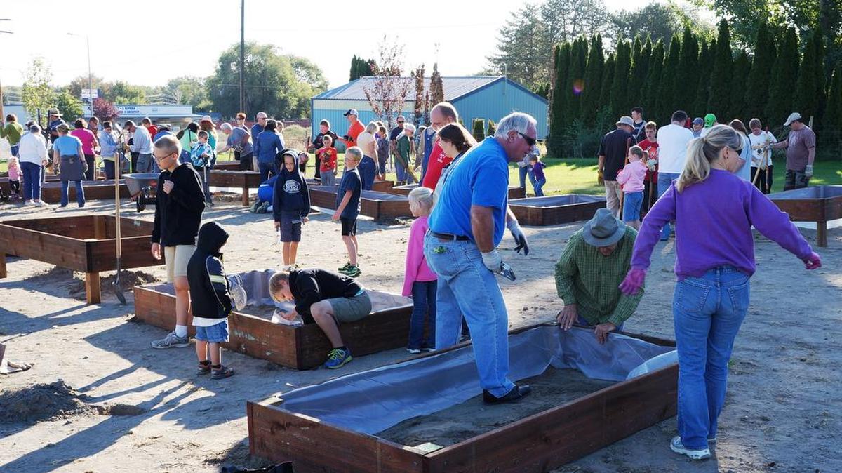 Volunteers work on the Yellowstone Trail Park Community Garden.