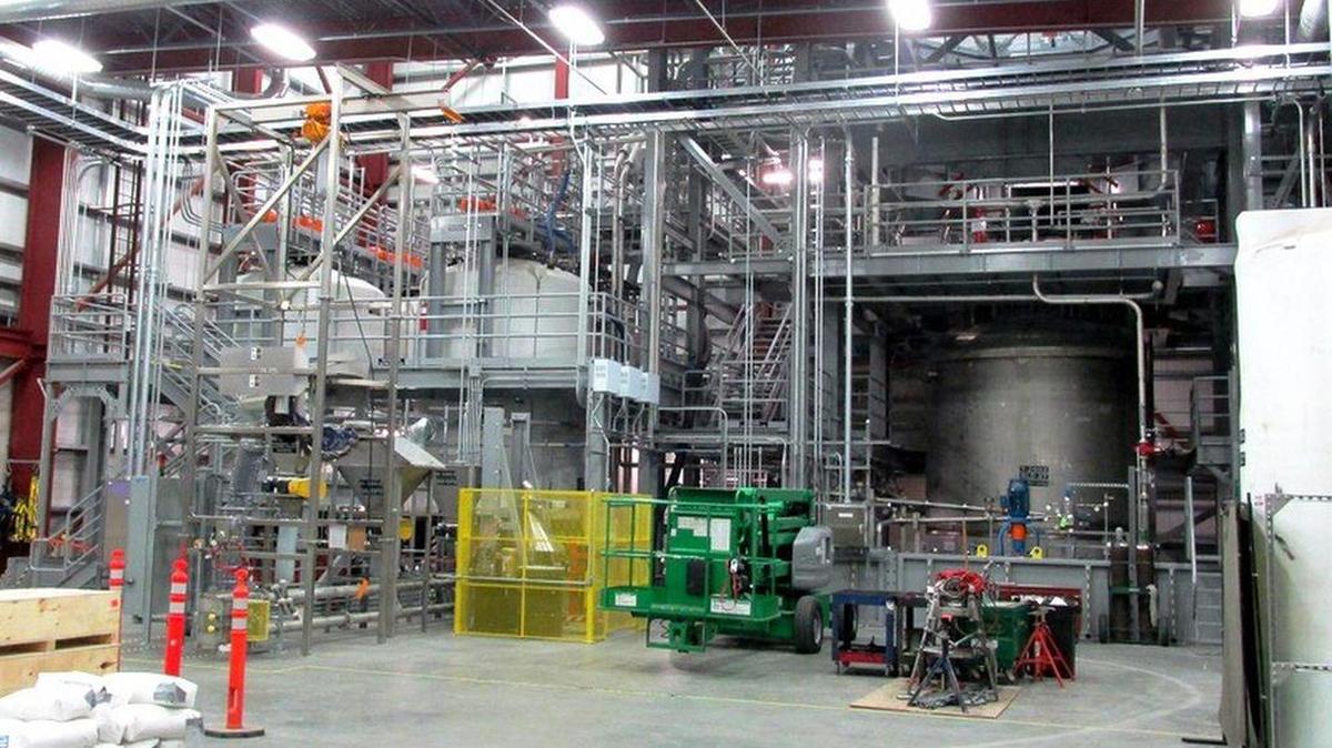 Large-scale mixing vessels and simulant prep tanks are installed in ESEL for WTP testing.