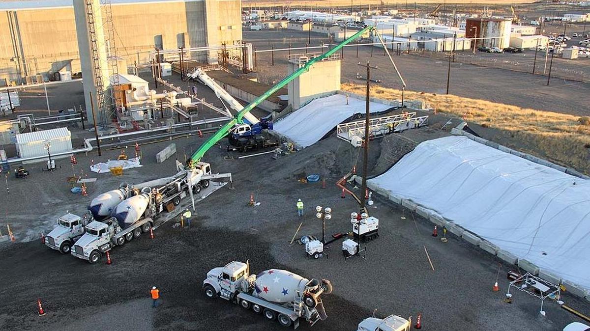 An aerial view of workers placing grout in PUREX Tunnel 1. Workers began placing grout in Tunnel 1 in early October and finished on Nov. 11. The Department plans to stabilize a second waste storage tunnel with engineered grout in 2018.