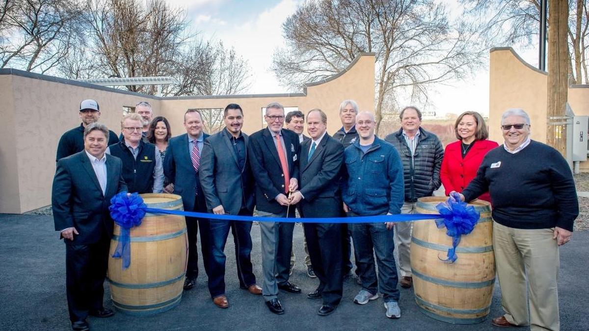 Winemakers, local officials and members of the community help officially open Columbia Gardens Urban Wine & Artisan Village at a ribbon-cutting ceremony in February. The Port of Kennewick will add more amenities, shovel-ready parcels for private development, and a third tasting room in 2018.