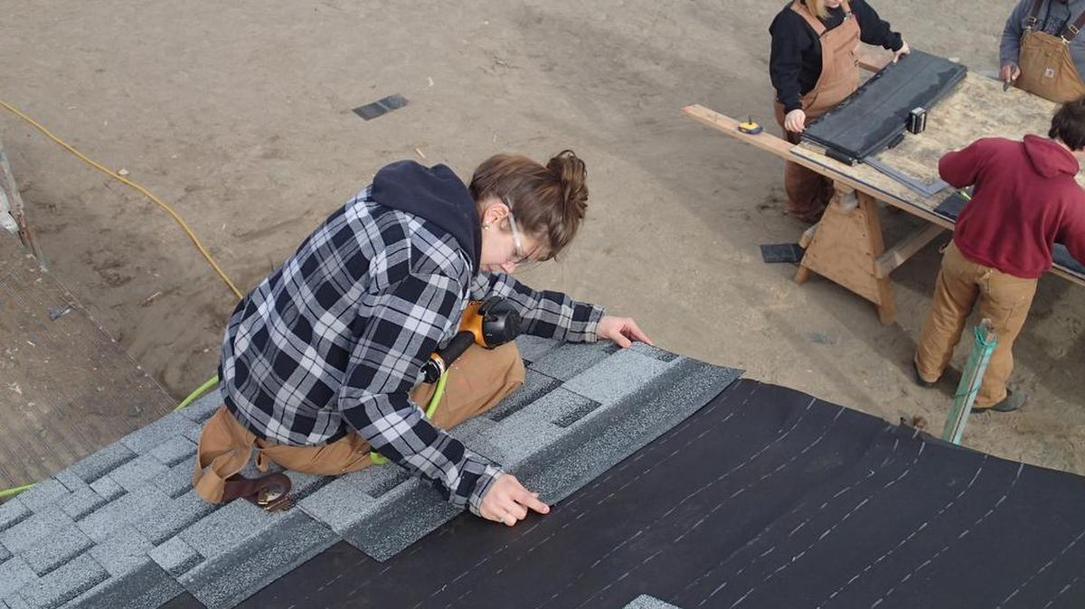 Students from Tri-Tech Skills Center work on a housing project.
