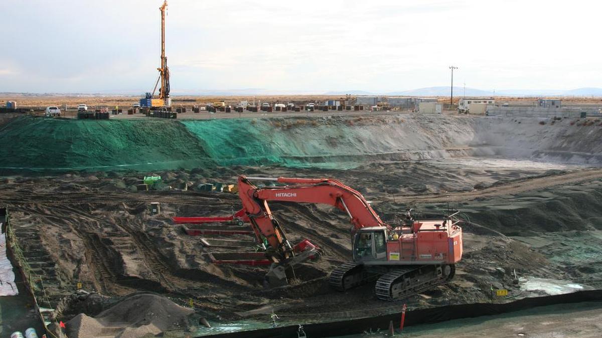 Washington Closure workers are cleaning up a hazardous seven-acre site called the 618-10 Burial Ground, processing highly contaminated drums and containers.