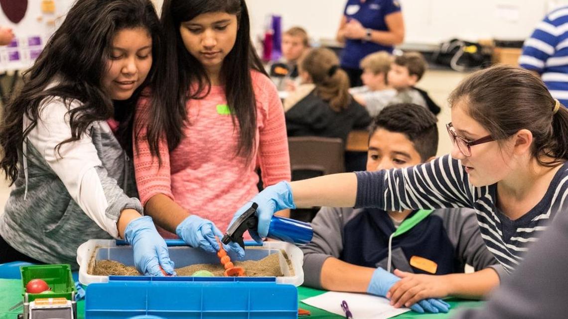 STEM Like ME! students at McLoughlin Middle School receive “hands-on” practice in environmental restoration careers.