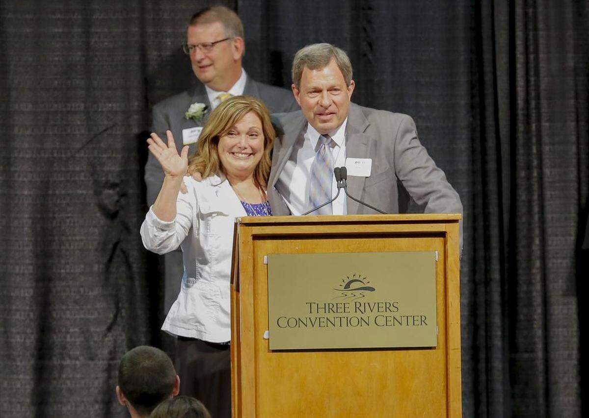 Don Pratt, entrepreneur, volunteer and philanthropist, accepts his 2018 Tri-Citian of the Year award with his wife by his side at Three Rivers Convention Center in Kennewick.