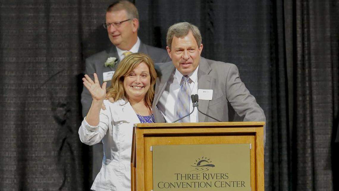 Don Pratt, entrepreneur, volunteer and philanthropist, accepts his 2018 Tri-Citian of the Year award with his wife by his side at Three Rivers Convention Center in Kennewick. 
