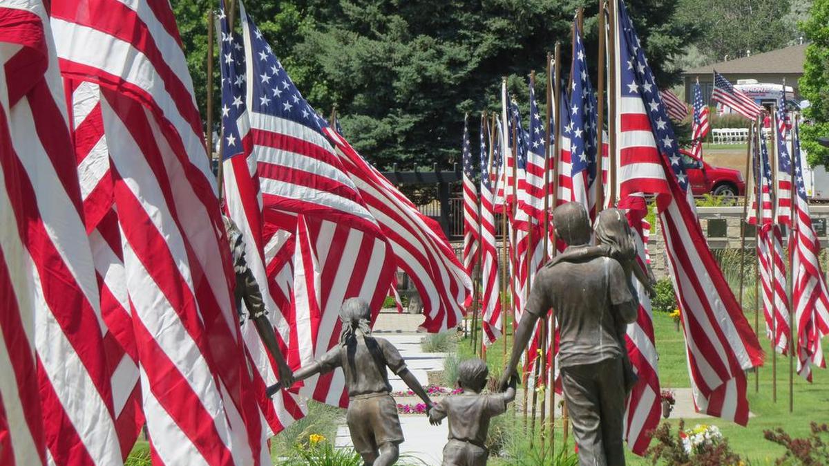 Flags line the paths at Sunset Gardens in Richland.