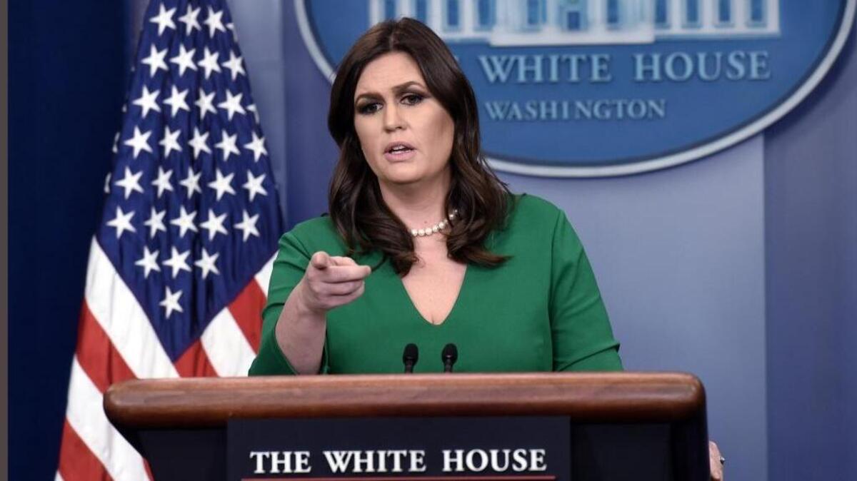 White House Press Secretary Sarah Huckabee Sanders answers reporters' questions during a news conference in the Brady Press Briefing Room at the White House Nov. 16.