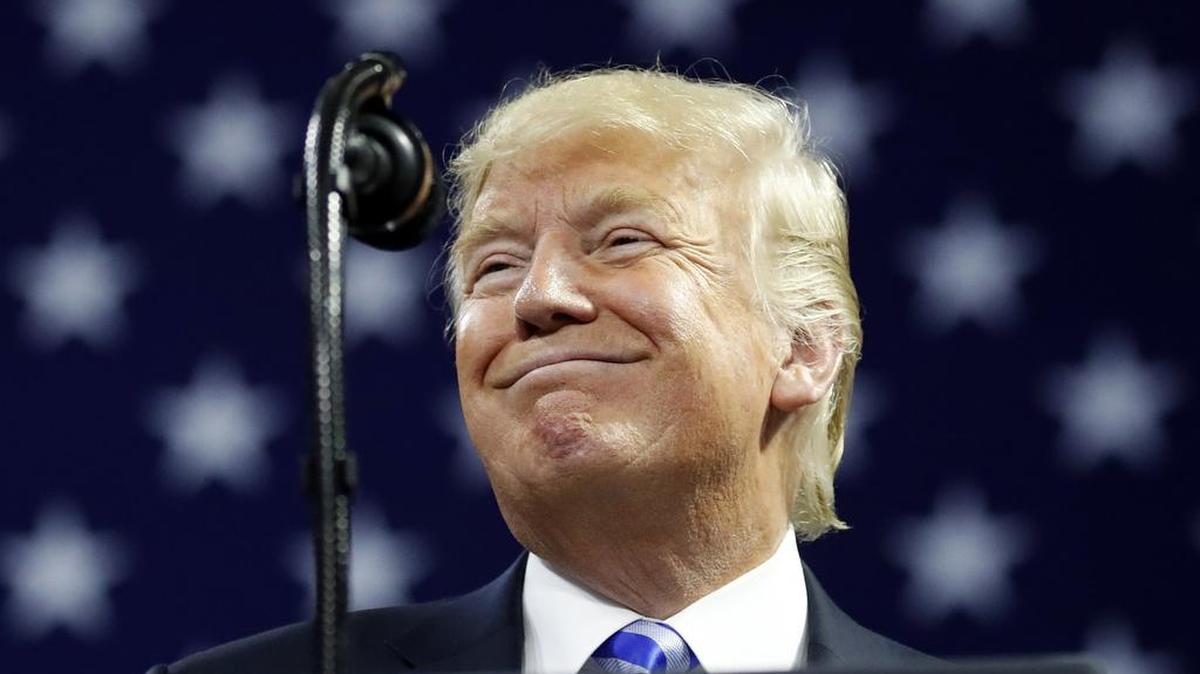 In this Aug. 21, 2018 photo, President Donald Trump pauses while speaking in Charleston, W.Va., where he assailed longtime personal attorney Michael Cohen for cooperating with prosecutors. Cohen pleaded guilty to breaking campaign-finance laws in 2016 by helping pay two women not to disclose affairs they’d had with the president.