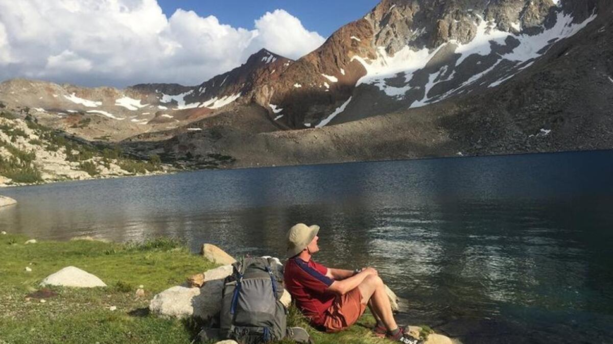 Nicholas Kristof enjoying part of his inheritance (as an American citizen), a lake on the John Muir Trail in California.