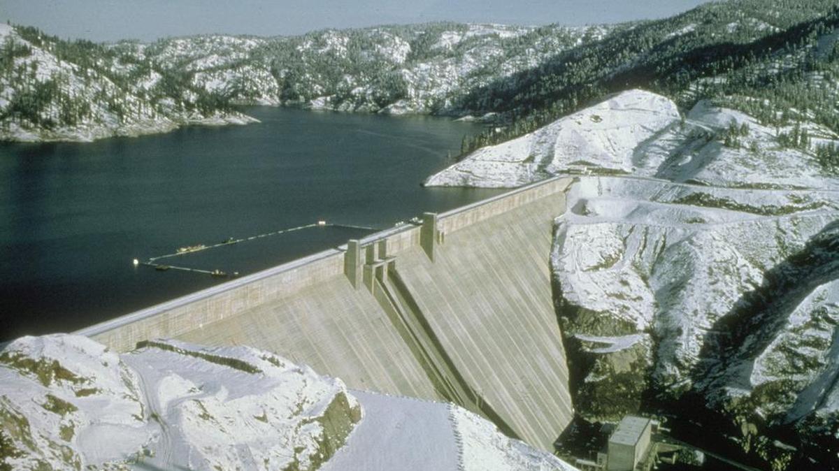 Snow blankets the ground surrounding Idaho’s Dworshak Dam in this undated aerial photo. The Corps of Engineers started spilling some of the Snake River system’s best “fish water” Monday, more than quadrupling releases from the reservoir.