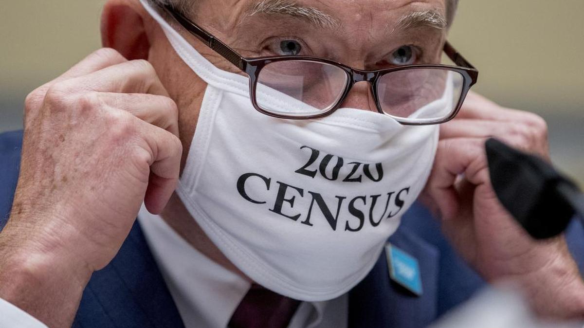 Census Bureau Director Steven Dillingham wears a mask with the words "2020 Census" as he arrives to testify before a House Committee on Oversight and Reform hearing on the 2020 Census on Capitol Hill, Wednesday, July 29, 2020, in Washington.
