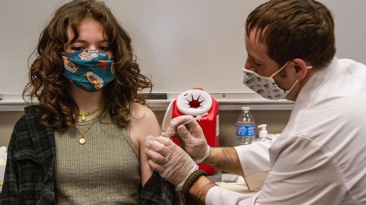WSU Running Start student Paris Burtner, 17, of Richland, receives a COVID-19 vaccine during a recent clinic held at the WSU Tri-Cities campus.