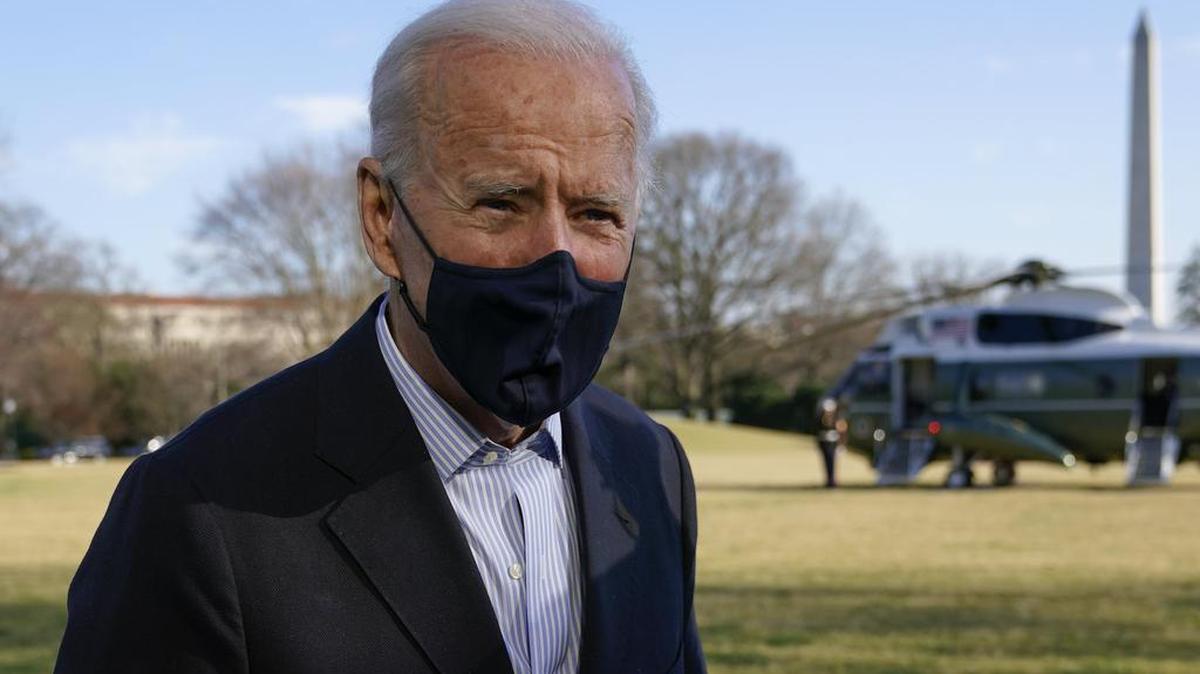 President Joe Biden speaks with members of the press on the South Lawn of the White House in Washington, Sunday, March 21, 2021, after stepping off Marine One. Biden was returning to Washington after spending the weekend at Camp David.