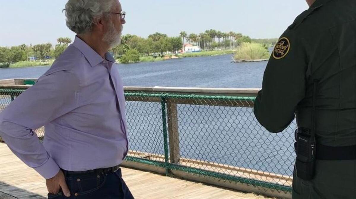 U.S. Rep. Dan Newhouse, R-Sunnyside, is receiving a briefing from U.S. Border Patrol about the challenges of securing the Rio Grande sector. Mexico is on the other side of the river.