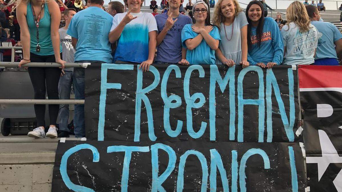 The Kamiakin student section, normally awash in scarlet and gold, instead sported light blue Friday night at the Braves’ football game against Chiawana at Lampson Stadium. Students from Kennewick and Pasco school districts wore the school colors of Freeman High School. The small school near Spokane was stunned Wednesday when a student shot and killed a classmate.