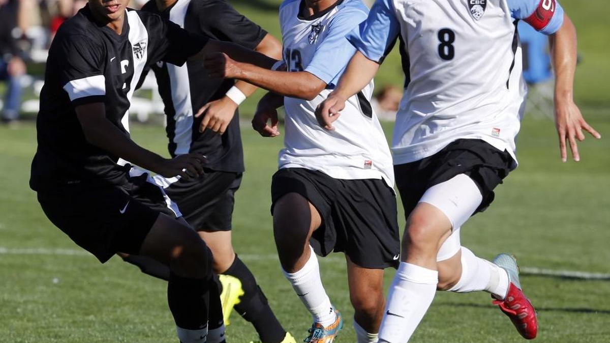 
Columbia Basin College’s Jason Rodriguez (8), Esteban Ojeda (13) and Walla Walla Community College’s Francisco Torres (2) chase down a ball Wednesday during a match at CBC in Pasco. See more photos at www.tricityherald.com.
