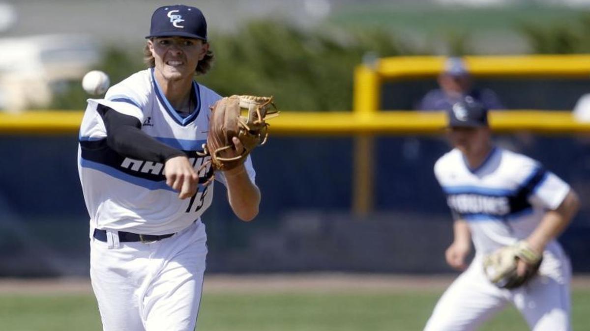 Columbia Basin College pitcher Tanner Simpson throws to first to get the runner during Saturday’s NWAC East doubleheader against Spokane in Pasco.