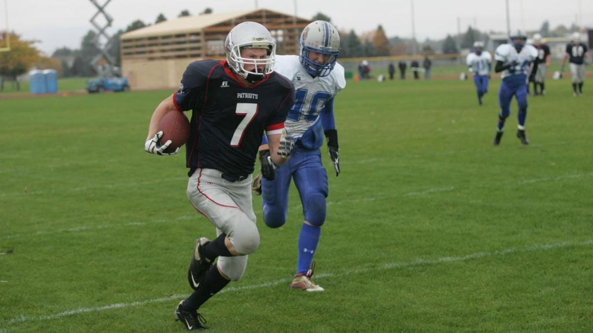 Minnesota Duluth senior football player Tyler Morris, running the ball for Liberty Christian during a 2012 blowout win over LaCrosse-Washtucna, made his third NSIC All-Academic team as a Bulldog this season.