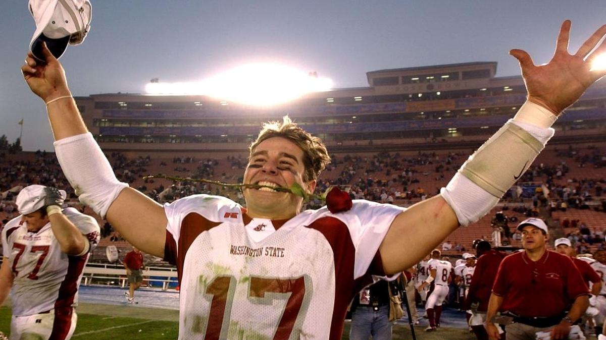Former Washington State quarterback Jason Gesser, seen after beating UCLA in 2002 to take the Cougars to the Rose Bowl, will talk about the state of WSU athletics at the Tri-Cities Cougar Tailgate on Friday at Gesa Stadium in Pasco.