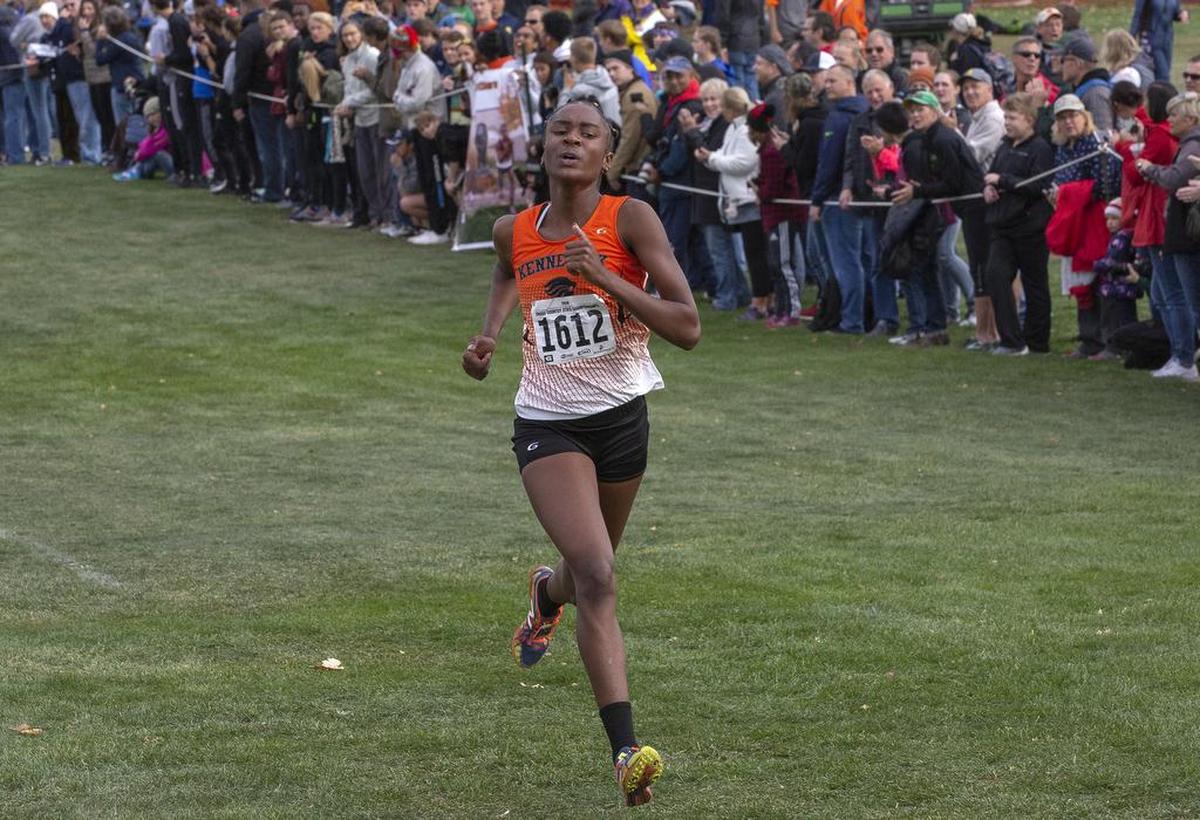 Kennewick’s Geraldin Correa competes in WIAA 3A girls cross country state championship at Sun Willows Golf Course in Pasco on Saturday. Correa took second with a time of 18:29.80.