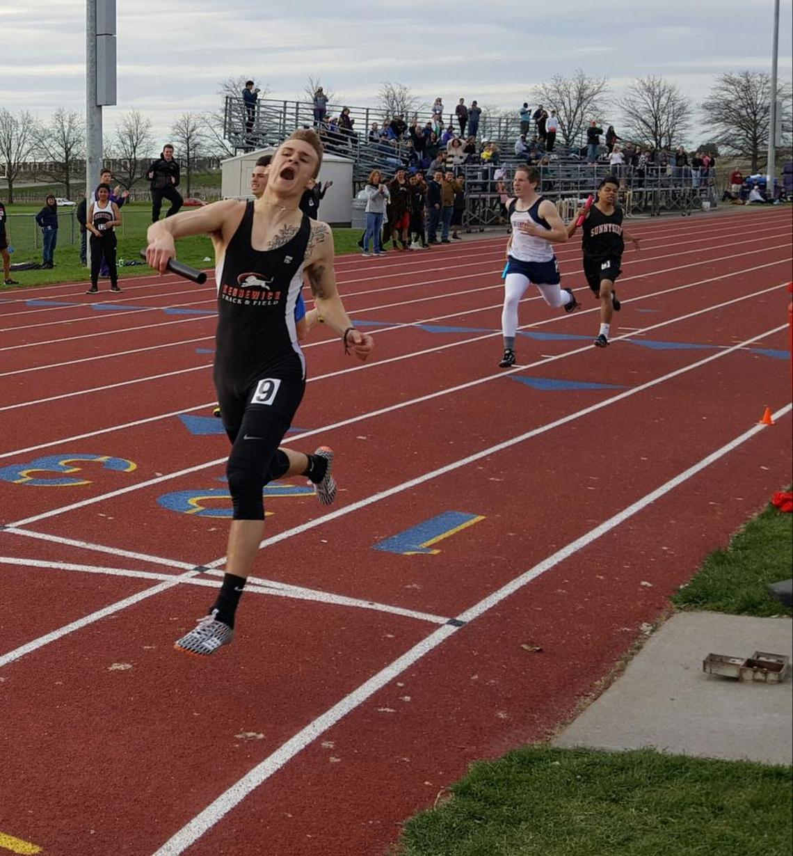 Austin Albertin crosses the finish line for Kennewick in first place in this file photo. Now competing for Spokane Community College, Albertin was a winner in the 400 hurdles and ran on two second-place relay teams.