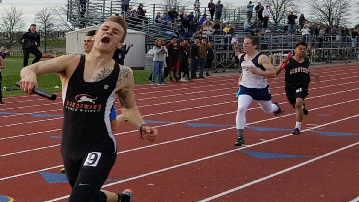Kennewick’s Austin Albertin crosses the finish line in first place in the 4x400 relay Saturday at the Clay Lewis Invitational. The Lions turned in a time of 3 minutes, 32.03 seconds.