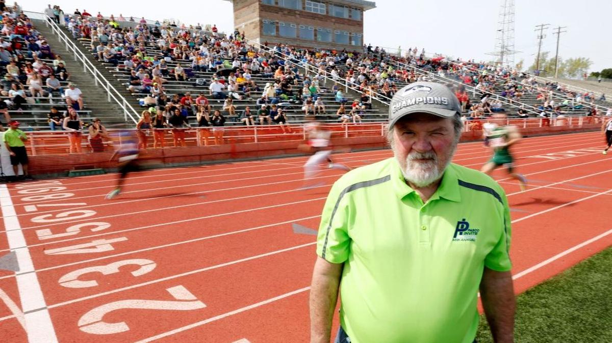 John Crawford poses for a photo during the boys 4x100-meter relay April 16 during the 55th annual Pasco Invite at the John Crawford Track at Edgar Brown Memorial Stadium in Pasco. Crawford directed the meet almost every year since 1974 and started his involvement in 1965. Crawford, who is scaling back his involvement after this year, will be inducted into the WIAA Hall of Fame on Wednesday.