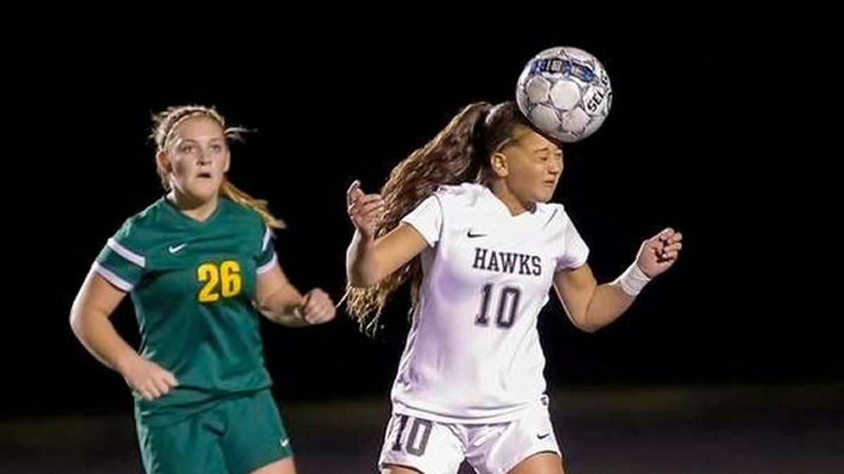 Chiawana’s Summer Yates (10) heads the ball during a 4A District 8 soccer game Tuesday against Richland in Pasco. Yates scored four goals in a 4-2 victory for the Riverhawks.