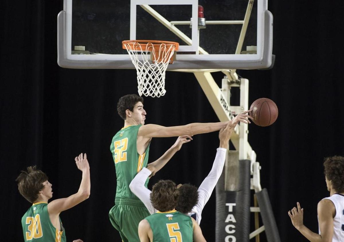 Richland's Riley Sorn makes one of his record 30 blocks during the 2017 Class 4A state basketball tournament at the Tacoma Dome, this one against Gonzaga Prep in the third- /fifth-place game.