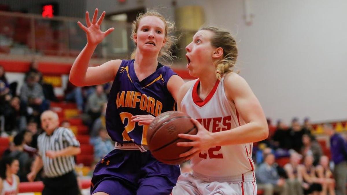 Kamiakin’s Alexa Hazel (22) tries to get a shot around Hanford’s Mikayla Mars (21) during a Mid-Columbia Conference girls basketball game Tuesday at Kamiakin High School in Kennewick. Hazel, a junior, scored 20 points to reach 1,000 for her career, and Kamiakin won 75-35.