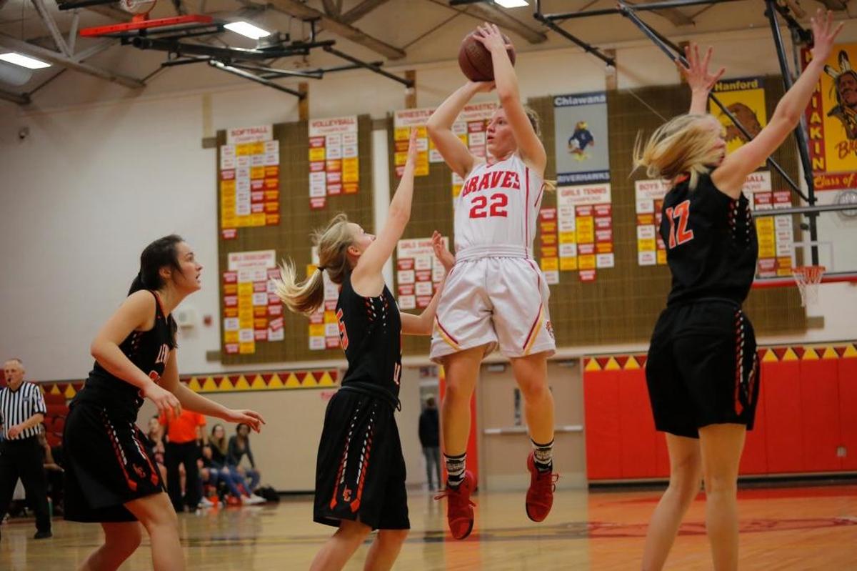 Kamiakin's Alexa Hazel (22) has a good look as she shoots against Lewis and Clark on Saturday. Hazel made four 3-pointers and scored 20 points.