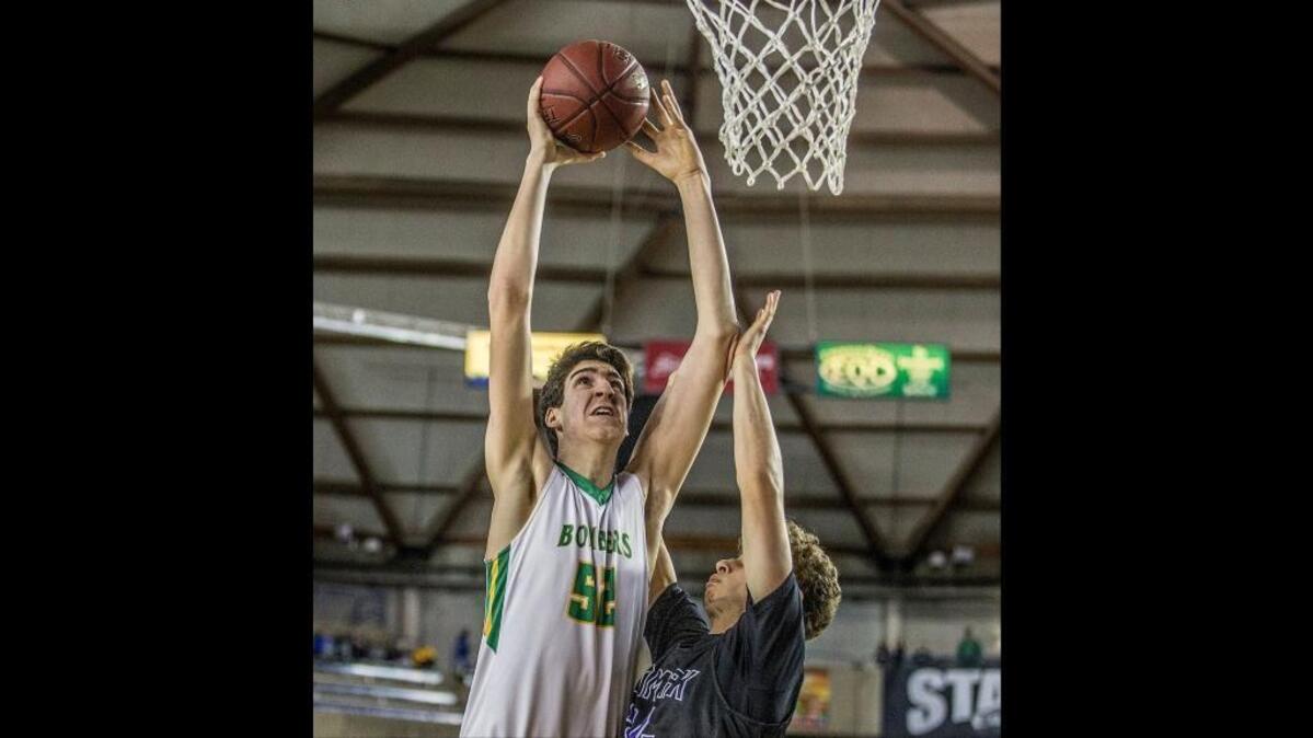 Richland’s Riley Sorn, putting up a shot during the Bombers’ state quarterfinal victory over Kamiak, is the Herald’s All-Area Boys Player of the Year.