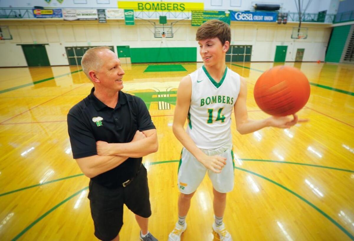 File photo -- Richland boys basketball coach Earl Streufert has coached sons Garret, right, Nathan and Michael during their high school careers.