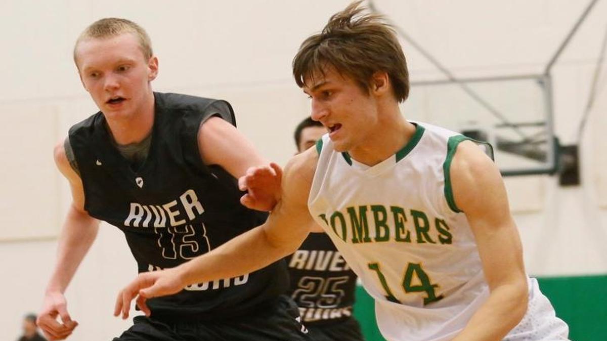 Richland guard Steven Beo (14) is a big reason the Bombers will contend for their third Mid-Columbia Conference title in a row. Chiawana guard Chandler Hansen (13) and the Riverhawks won’t make it easy for them.