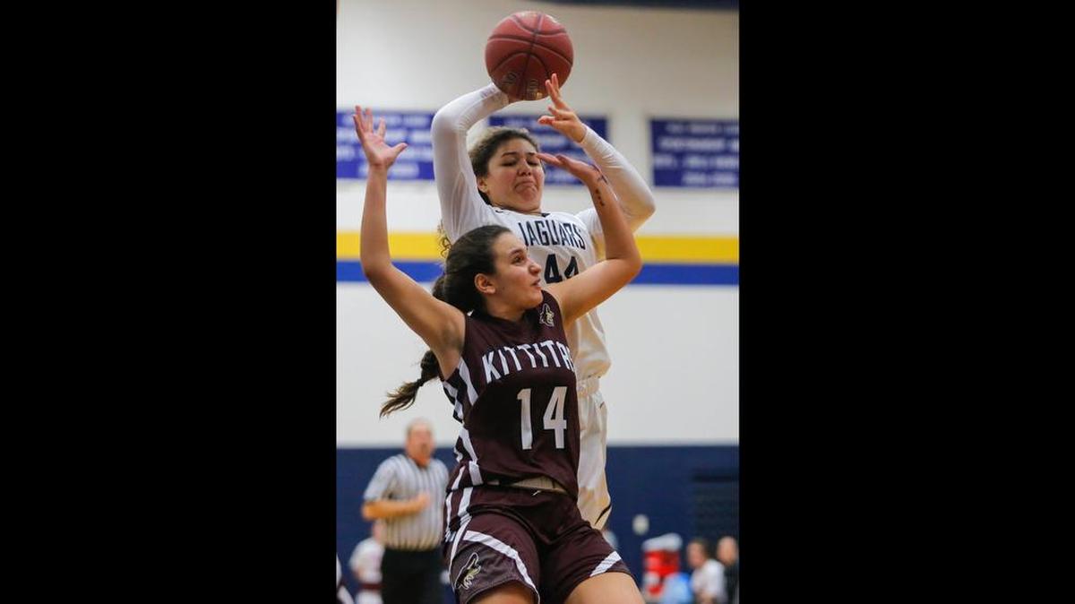 Tri-Cities Prep's Talia Von Oelhoffen (44) shoots the ball while being guarded by Kittitas's Aina Martinez (14) during a high school girls basketball game on Friday at Tri-Cities Prep in Pasco. Tri-Cities Prep won 59-40. Von oelhoffen, a freshman, was named the All-EWAC Co-Player of the Year on Tuesday. Martinez earned a second-team nod.