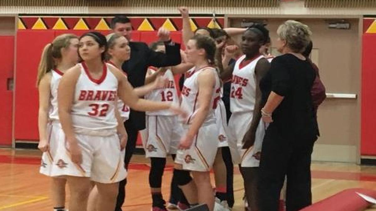 Kamiakin breaks the huddle after beating Garfield 76-54 to advance to regionals Tuesday at Kamiakin High School