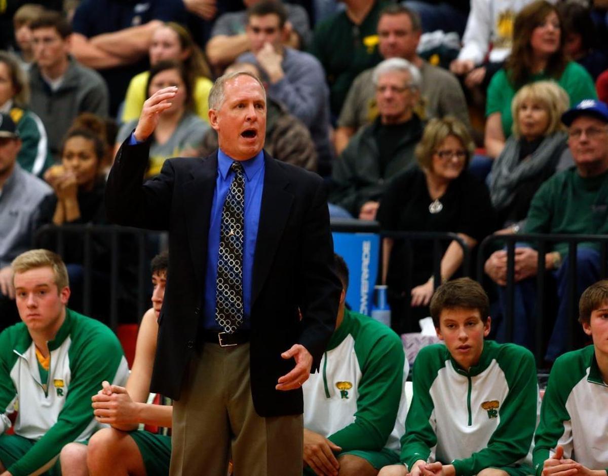 Richland boys basketball coach Earl Streufert, seen during a 2016-17 game against Kamiakin, has coached sons Nathan, Michael and Garrett during their high school careers.