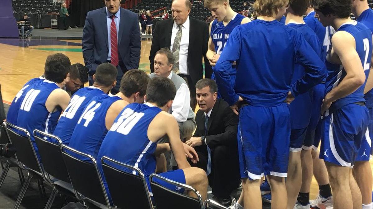Walla Walla boys coach John Golden talks to his team during a District 8 Class 4A playoff game against Lewis and Clark on Friday at the Spokane Arena. The Blue Devils suffered a season-ending, 57-51 defeat.