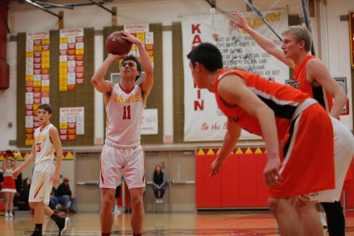 Kamiakin’s Garrett Paxton attempts a free throw during a game against Kennewick Dec. 9 at Kamiakin High School. Paxton is second in the MCC in scoring this season at 17.7 points per game.