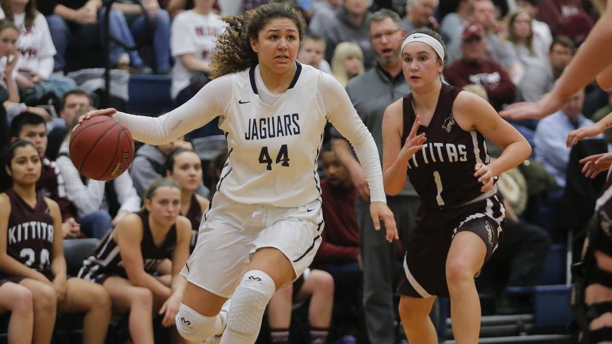 Tri-Cities Prep’s Talia von Oelhoffen (44), driving to the basket during a game against Kittitas-Thorp earlier this season, scored 23 points in the Jaguars’ 60-45 win over visiting Liberty Christian on Saturday to clinch a share of the team’s first league title in its history.