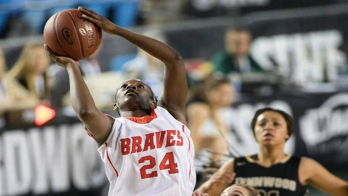 Kamiakin sophomore Oumou Toure, shooting the ball against Lynnwood in the Class 3A fourth/sixth-place game at the Tacoma Dome, is the Tri-City Herald’s girls basketball Player of the Year. Toure averaged 23.7 points, 12 rebounds and 2.5 assists per game this season, and led the Braves to a 25-2 record and fourth-place finish at state.