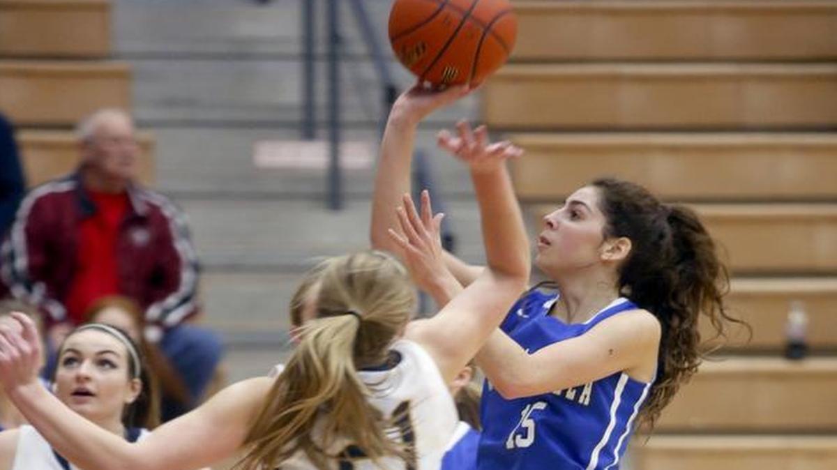 Walla Walla’s Kate Hogan (15) takes a shot over Southridge’s Shyler Sullivan (21) during Tuesday’s Mid-Columbia Conference game at Southridge. See more photos at www.tricityherald.com.