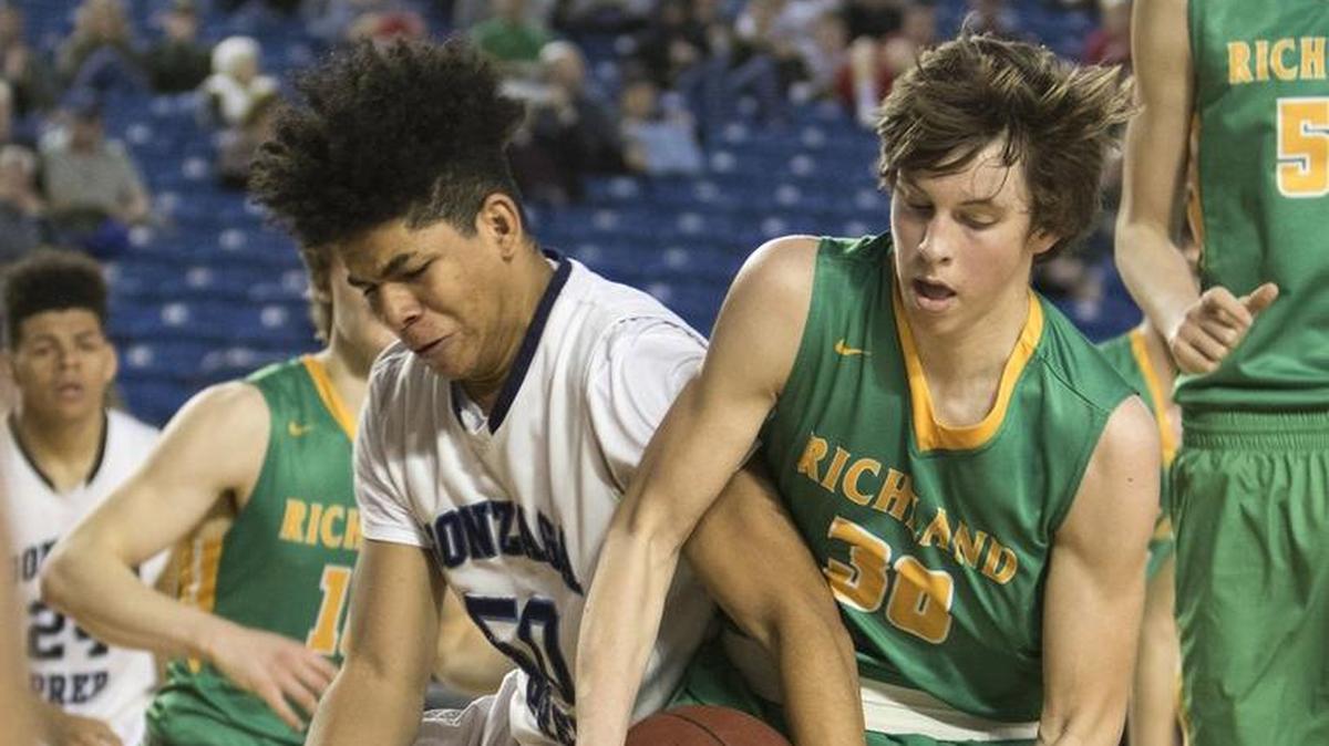 Richland’s Garrett Streufert, right, who averages 12.11 points per game, has helped the Bombers gain national attention. Richland is ranked No. 15 in this week’s USA Today poll.
