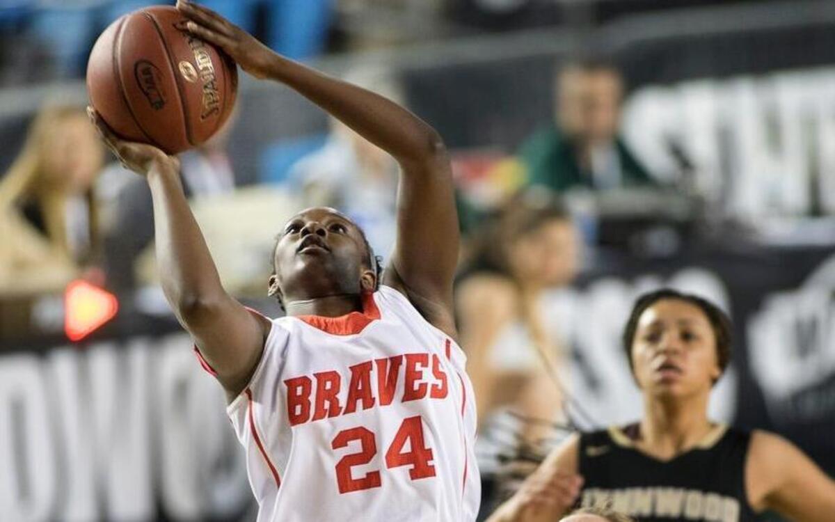Kamiakin’s Oumou Toure puts up a shot during Saturday’s 3A state tournament game in Tacoma. Toure was named to the all-tournament first team after averaging 25.7 points, 10 rebounds, 3 steals and 2.3 blocks.