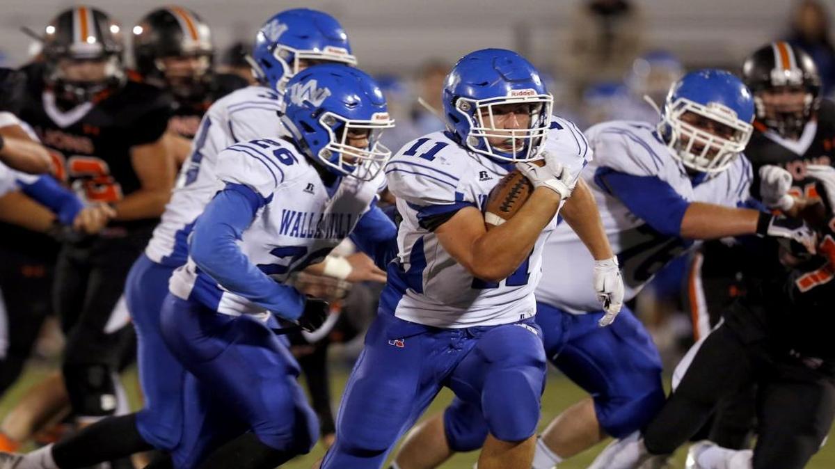 Walla Walla senior running back Brennan Barberich (11) missed part of the 2015 season because of a back injury. He and fellow senior back Sam Hoe (26) will look to lead the Blue Devils’ rushing attack this year.