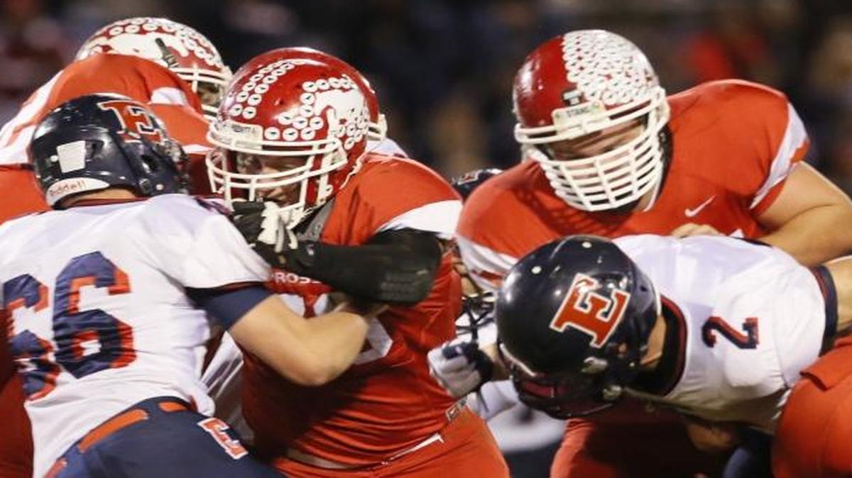 The Prosser Mustangs (in red) will open their season Friday against Kennewick at Lampson Stadium.
