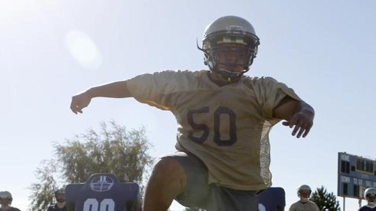 Tri-Cities Prep offensive lineman Jesus Higareda jumps over a bag during drills at practice Friday evening at the school’s baseball complex in Pasco. Higareda and the Jaguars are preparing to play in the new Eastern Washington Athletic Conference this season.
