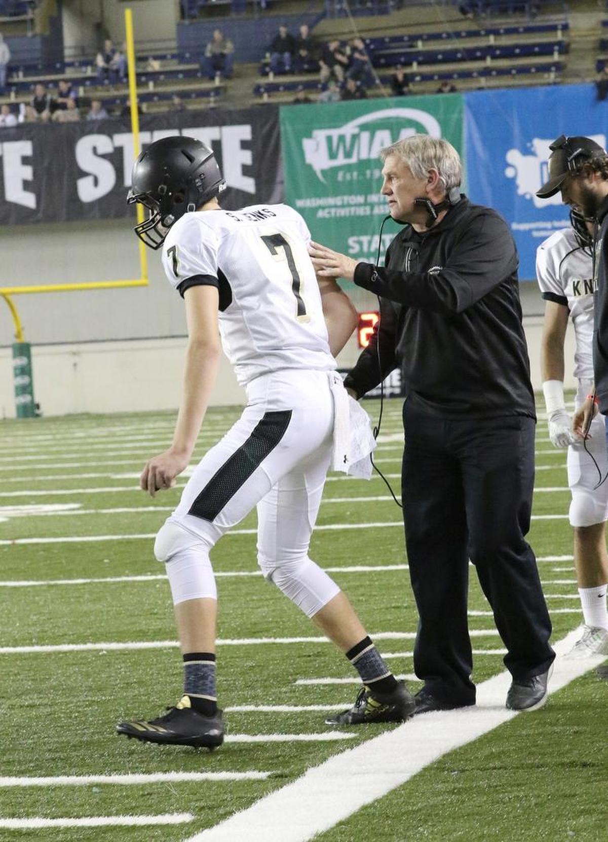 Royal coach Wiley Allred (right), who led the Knights to the Class 1A state football title Dec. 2, will be one of six championship coaches to raise the 12th Man Flag Dec. 17 at a Seattle Seahawks game.